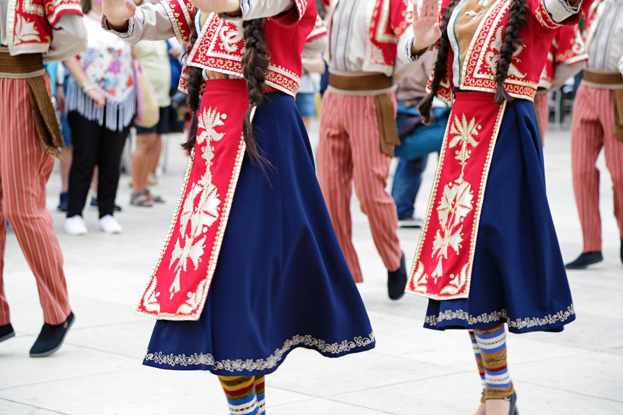 Dancers dancing and wearing one of the traditional folk costume from Armenia